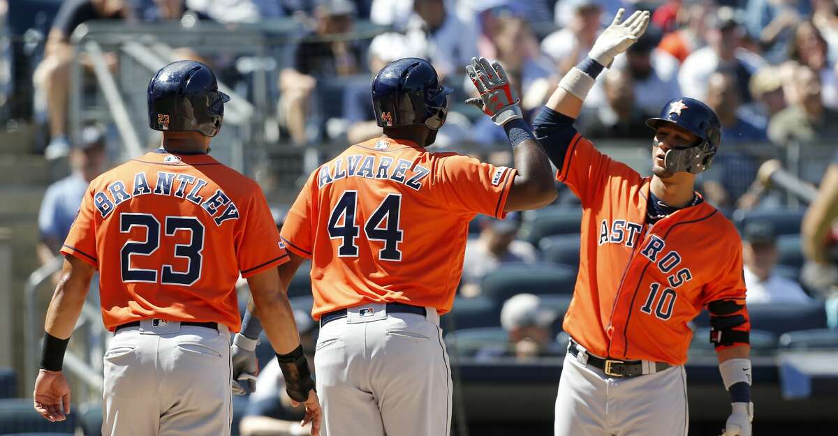 NEW YORK, NEW YORK - JUNE 23: Yordan Alvarez #44 of the Houston Astros celebrates his fifth inning two run home run against the New York Yankees with teammates Michael Brantley #23 and Yuli Gurriel #10 at Yankee Stadium on June 23, 2019 in New York City. (Photo by Jim McIsaac/Getty Images)