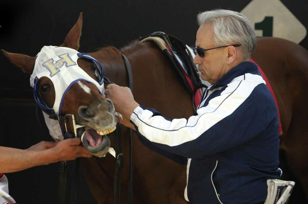 Trainer Jerry Hollendorfer preps U R All That I Am, who finished in second place in the first race, at Golden Gate Fields in Berkeley, Calif., on Friday, April 24, 2009. Another one of Hollendorfer's horses, Chocolate Candy, is entered in this year's Kentucky Derby.