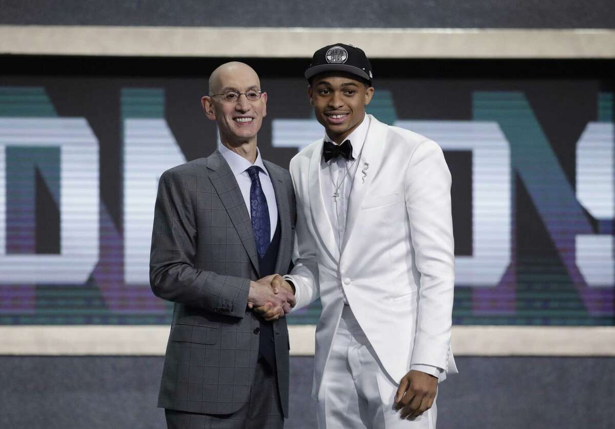 Keldon Johnson, right, stands with NBA Commissioner Adam Silver after the Kentucky forward was selected with the 29th pick overall. He played one year for the Wildcats, earning freshman of the year honors in the Southeastern Conference.