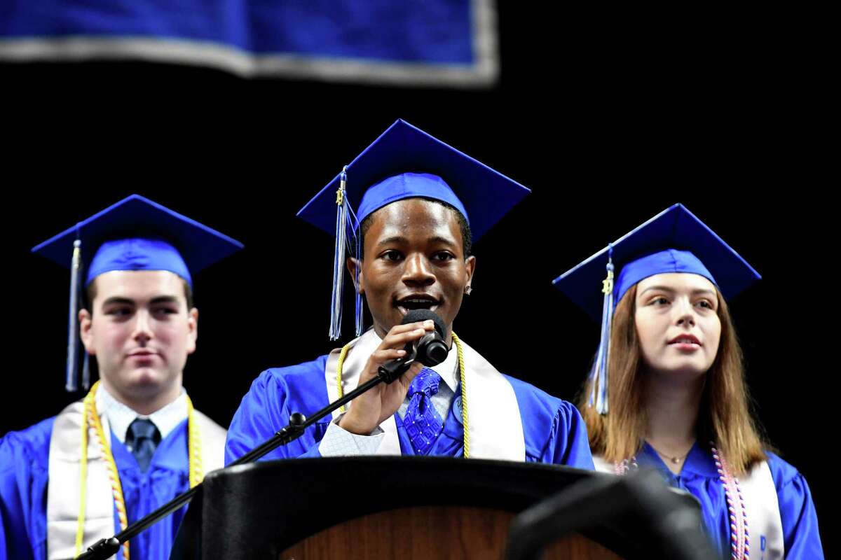 Albany High School Class of 2019 co-presidents Jeffery Lambo, left, Ben Morton, center, and Nancy Lundberg, right, give the class presidents address at the 149th commencement on Sunday, June 23, 2019, at the Times Union Center in Albany, N.Y. (Catherine Rafferty/Times Union)