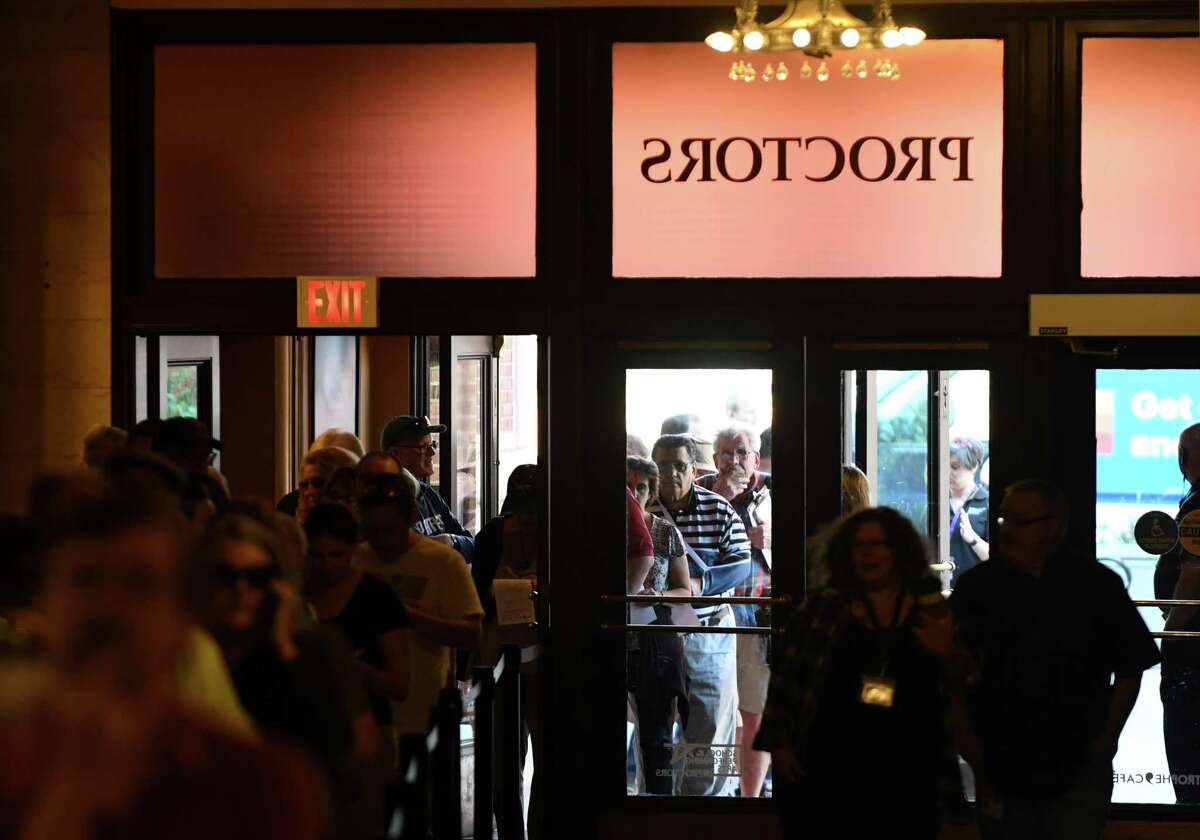People stand in a line that stretched around the block to purchase tickets for "Hamilton" at Proctors on Monday morning, June 24, 2019, in Schenectady, N.Y. (Will Waldron/Times Union)