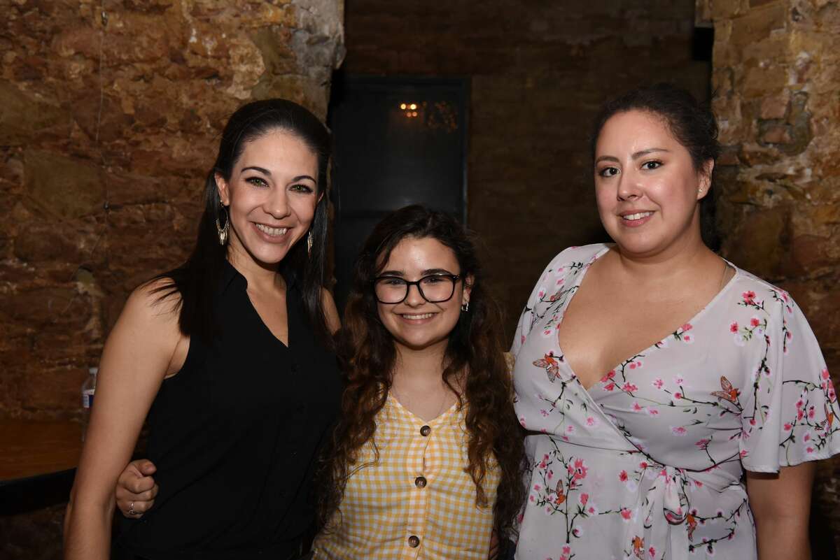 Laredoeans gather and watch a film and live show during the Laredo Film Society film screening and dance party at Gallery 201, Friday, June 21, 2019.
