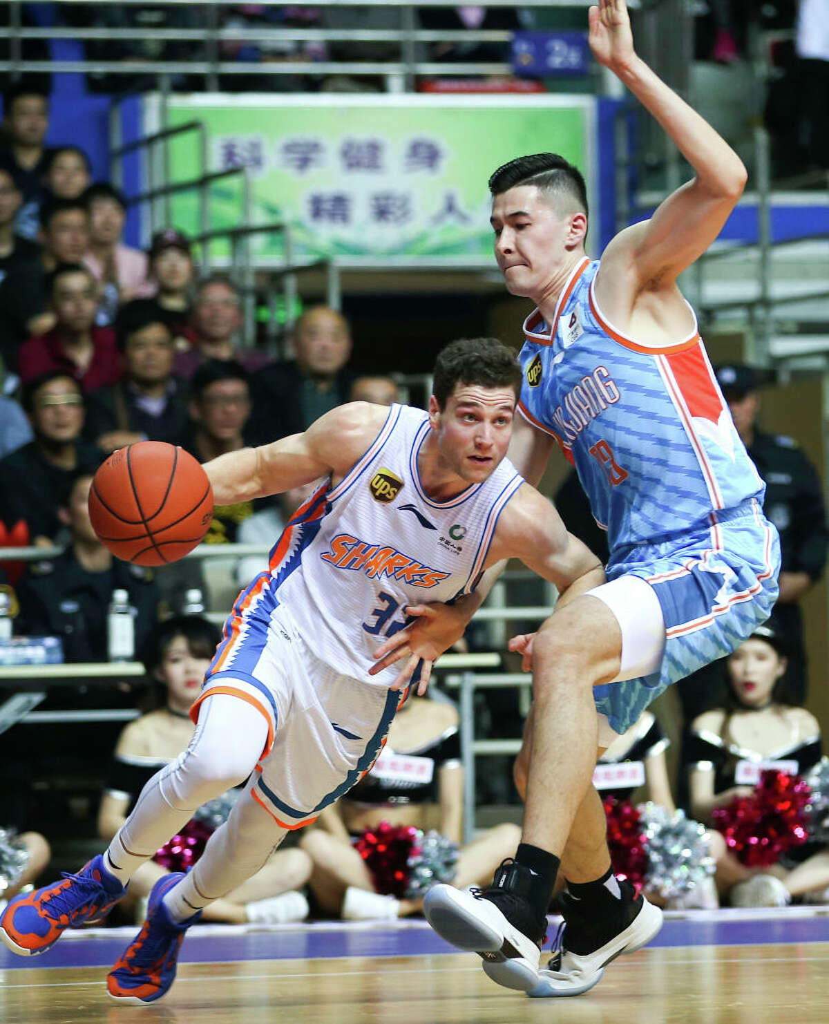 Jimmer Fredette of Shanghai Bilibili Sharks drives the ball during the 2018/2019 Chinese Basketball Association (CBA) League 13th round match between Shanghai Bilibili Sharks and Xinjiang Guanghui Flying Tigers at Pudong Yuanshen Gymnasium on November 18, 2018 in Shanghai, China.