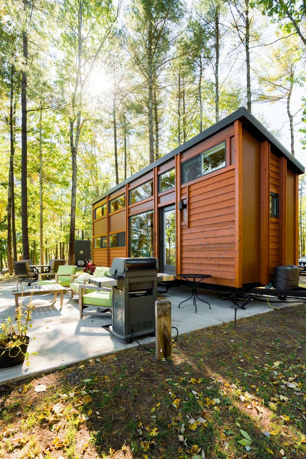 South Cairo, the Catskills. Five guests, one bedroom, one bed, one bath. "Tiny house perched over Catskill Creek. ... The compact interior offers a neatly arrayed, wood-paneled layout featuring soaring ceilings on the main floor, and an extra sleeping loft." $225 per night. See website.