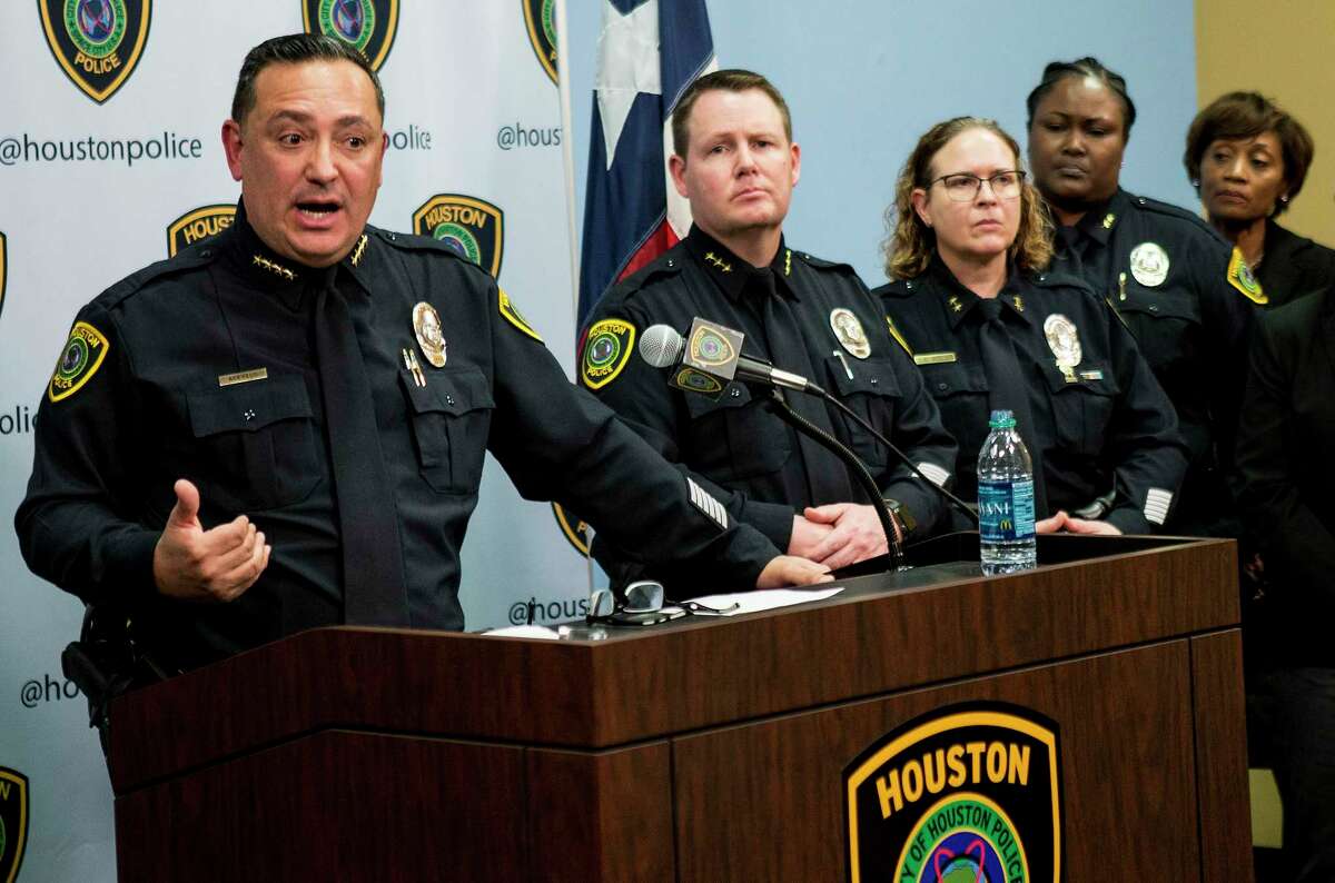 Houston Police Chief Art Acevedo, left, gives an update in the investigation of the officer-involved shooting, that left four HPD officers shot and two suspects dead, during a news conference Thursday, Jan. 31, 2019, in Houston.