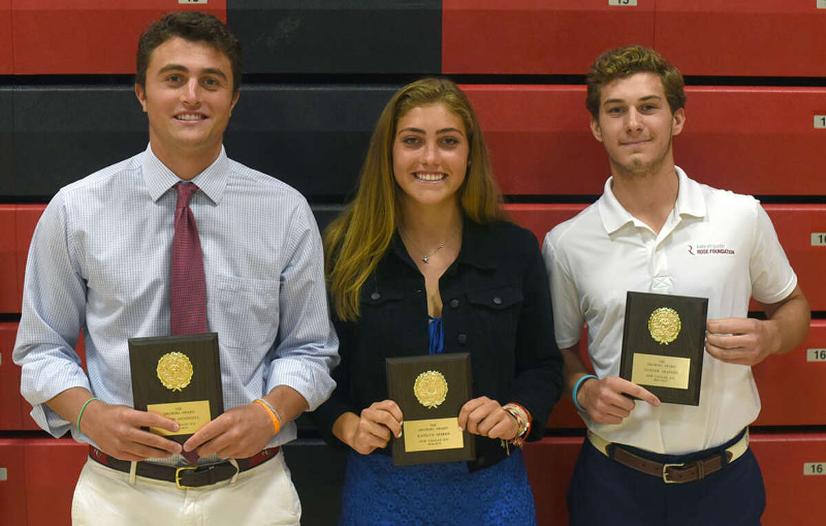 New Canaan’s Joe Sikorski Memorial Award, given annually to selected Rams’ seniors, was awarded to, from left, Quintin O’Connell, Katelyn Sparks and Gunnar Granito for the 2018-19 school year. They received the award during a ceremony at NCHS on Monday, June 17, 2019. — Dave Stewart/Hearst Connecticut Media