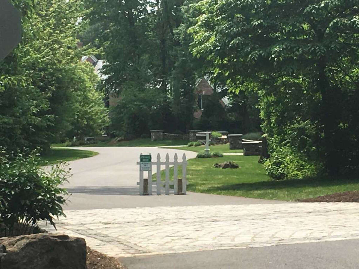 Outside Fotis Dulos' Jefferson Crossing residence in Farmington, Conn., on June 1, 2019. Dulos' estranged wife, Jennifer Dulos, went missing on May 24, 2019. Police questioned Fotis Dulos on May 31 and searched his house the following day. Photo: Dan Haar / Hearst Connecticut Media