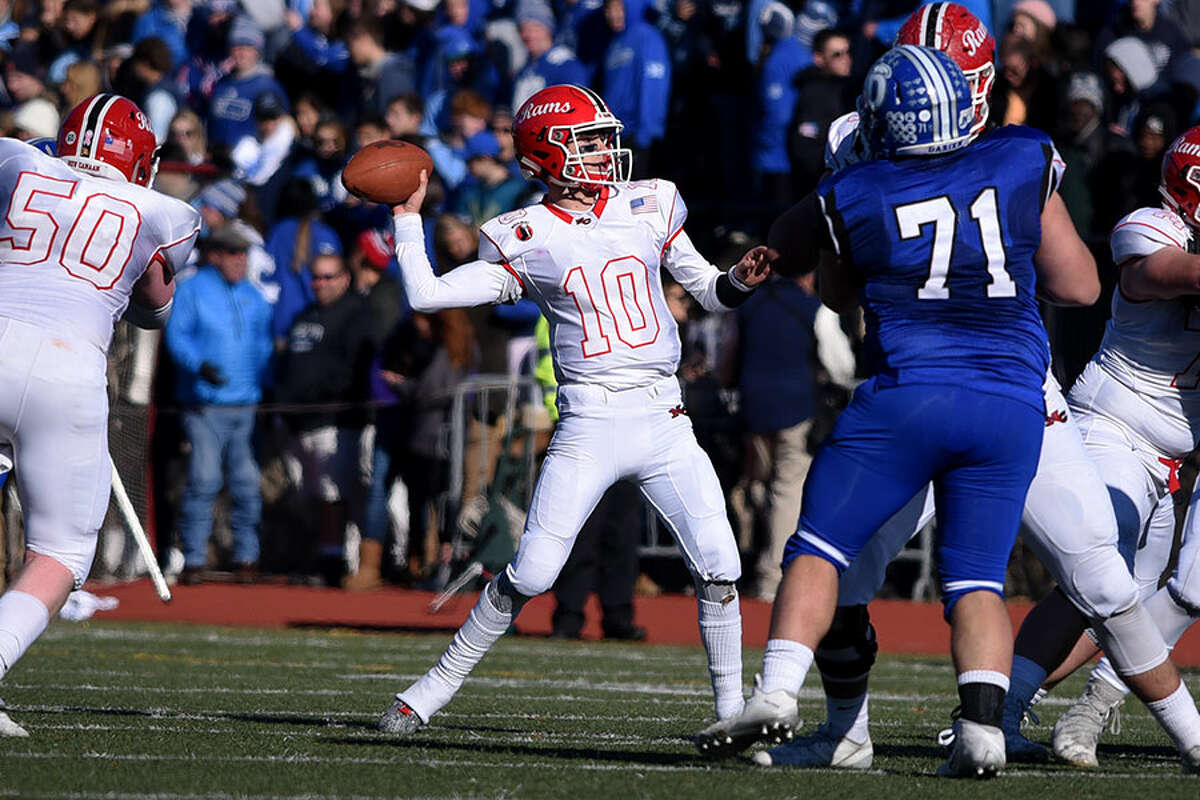 New Canaan quarterback Drew Pyne throws a pass during the Turkey Bowl at Dunning Field in November. — Dave Stewart photo