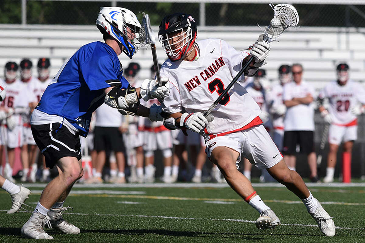 New Canaan's Owen Shin (3) in action against Ludlowe in the opening round of the CIAC Class L playoffs on Wednesday. — Dave Stewart photo