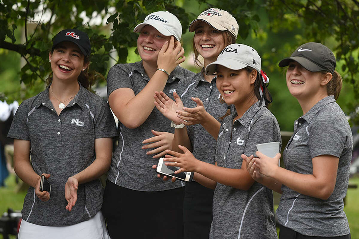 The New Canaan Rams, from left, Morgan Hibbert, Meghan Mitchell, Lauren Capone, Julia Bazata and Caroline Addeo, are all smiles after winning the 2018 FCIAC girls golf championship on Thursday. — Dave Stewart photo