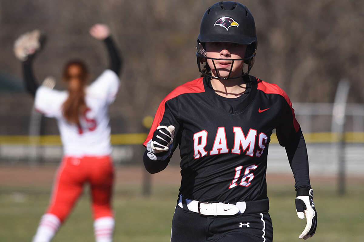 New Canaan’s Kaitlyn Fico (16) rounds the bases on a double by Ava Biasotti during a softball game against Greenwich in Waveny Park on Monday, April 1. — Dave Stewart/Hearst Connecticut Media