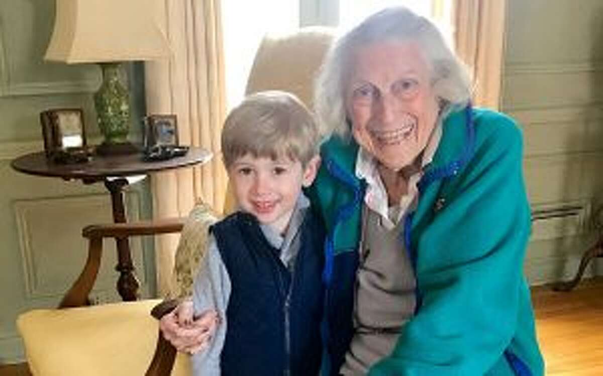 New Canaan: Volunteers are important, and meaningful to the community. The Little Rams, children of members of the Young Women’s League, helped 60 Staying Put members get a jump on spring by delivering potted plants and cheer.  Here, Hunter Morgan visits with Mimi McMennamin.