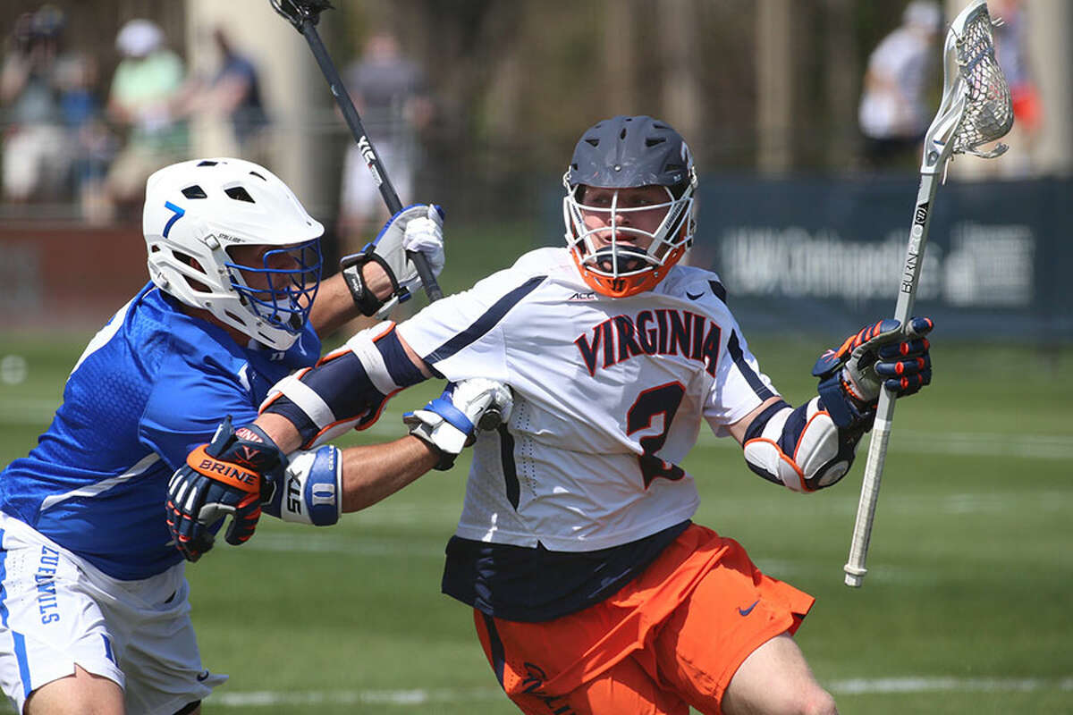 Michael Kraus of the University of Virginia works with the ball during a game last season. — Matt Riley/UVA Media Relations photo