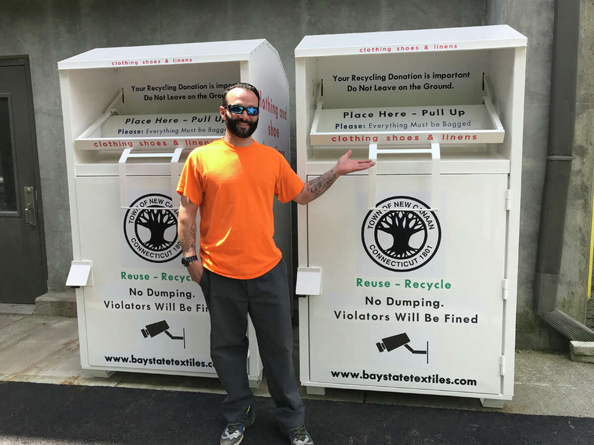 Bins where textiles can be recycled have been set up at the New Canaan Transfer Station. Eric Pot stands next to the one of the new textile bins. Contributed photo