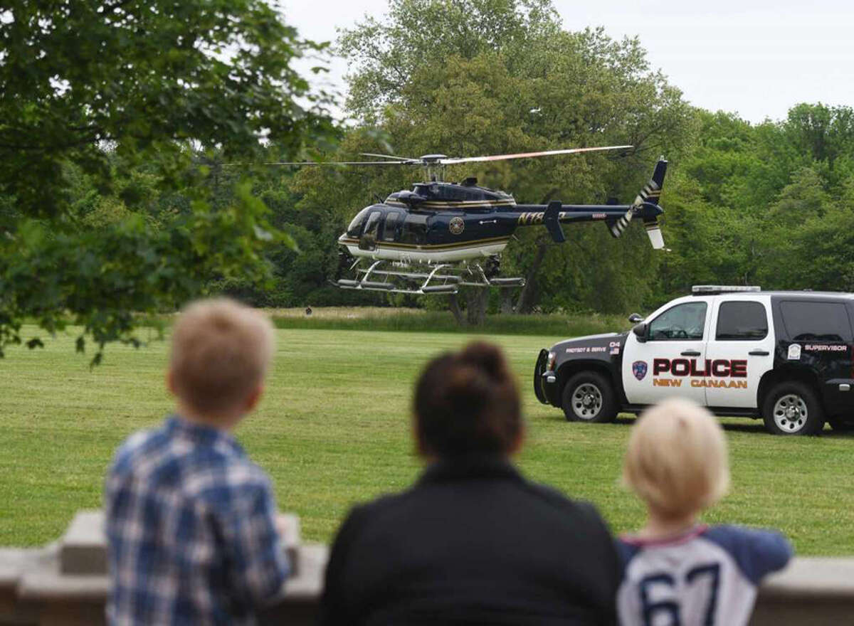 A New York State Police helicopter aids in the search for missing person Jennifer Dulos at Waveny Park in New Canaan, Conn. Wednesday, May 29, 2019. Dulos was reported missing Friday evening and police searched the area surrounding her neighborhood on Tuesday and the woods of Waveny Park on Wednesday. Photo: Tyler Sizemore / Hearst Connecticut Media