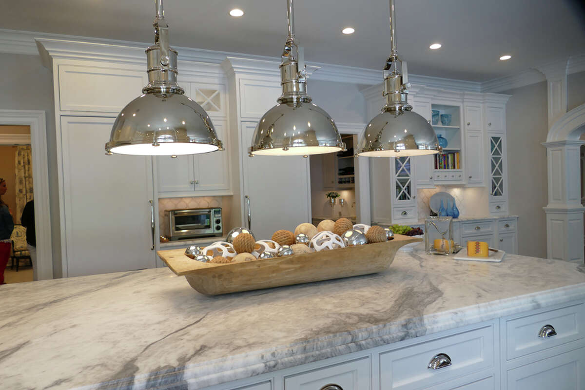 New Canaan Tour goers of New Canaan CARES Kitchen and Home Tours on May 16, 2019 gathered inspiration for abodes of their own. The homes on the New Canaan Cares Kitchen & Home Tour feature a wide variety of extraordinary chandeliers, lighting and pendants as seen during the tour on Thursday, May 16, 2019. Grace Duffield / Hearst Connecticut Media