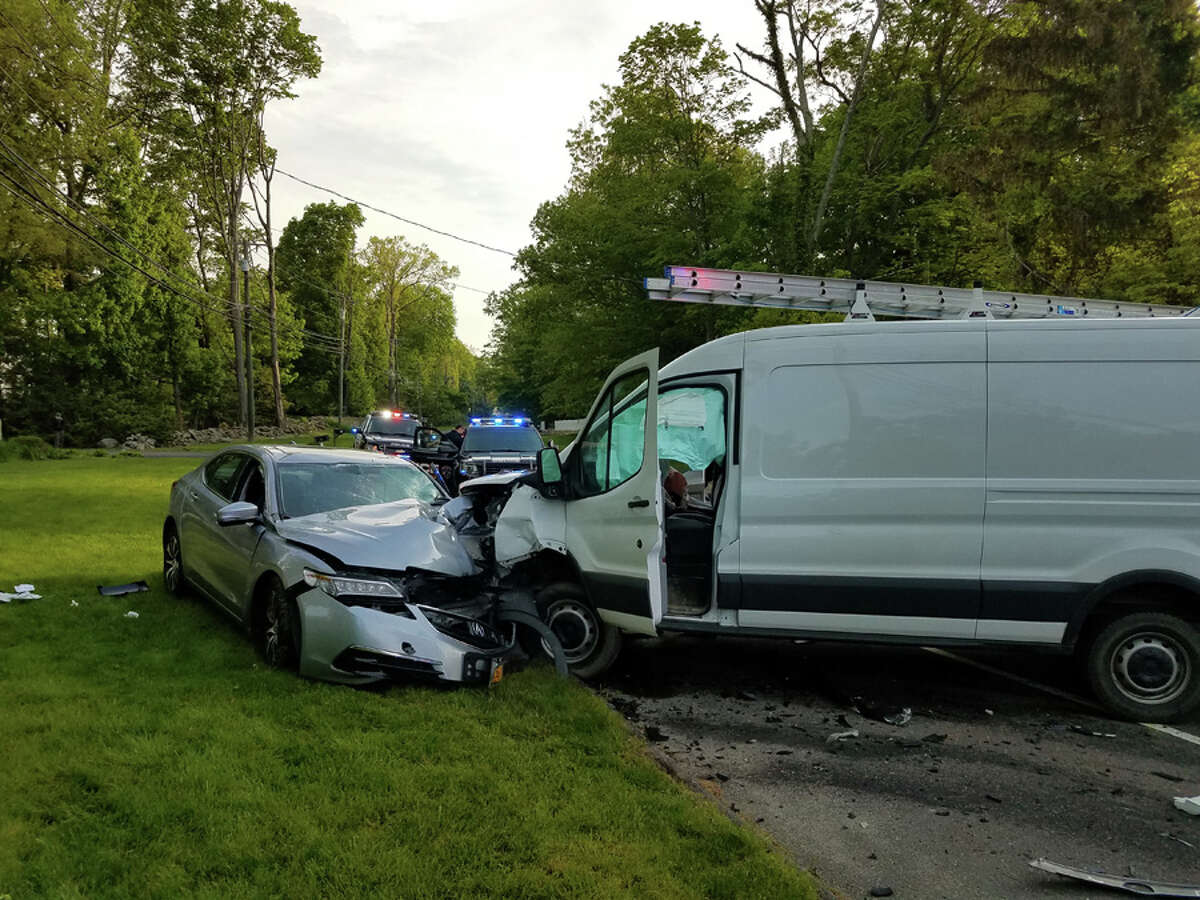 Pictured is the scene of a head-on crash on Smith Ridge Road in New Canaan early Friday, May 17, 2019. New Canaan Fire Department / Contributed photo