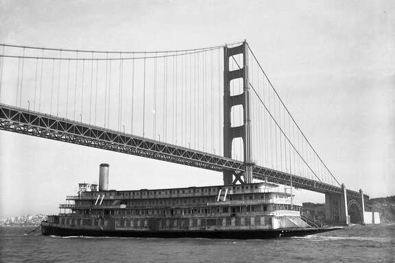 The Delta King passes under the Golden Gate Bridge while returning from British Columbia, 1959