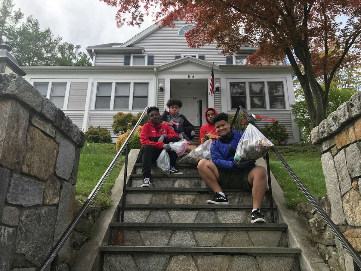Students from A Better Chance volunteered to pick up trash on Locust Avenue as part of the recent Clean Your Mile Campaign. Contributed photo