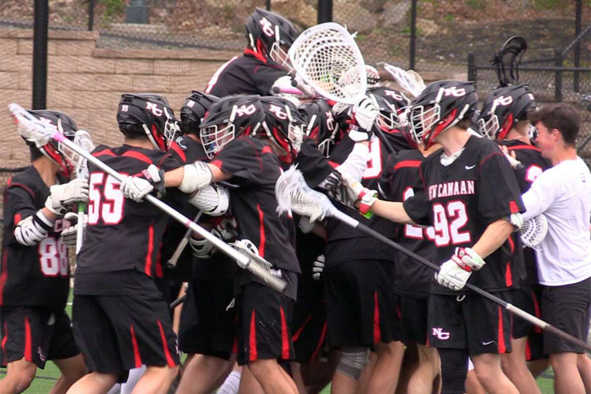 New Canaan celebrates its 15-12 victory over Fairfield Prep Saturday, May 4, 2019 at Rafferty Stadium in Fairfield. — Sean Patrick Bowley/Hearst Connecticut Media