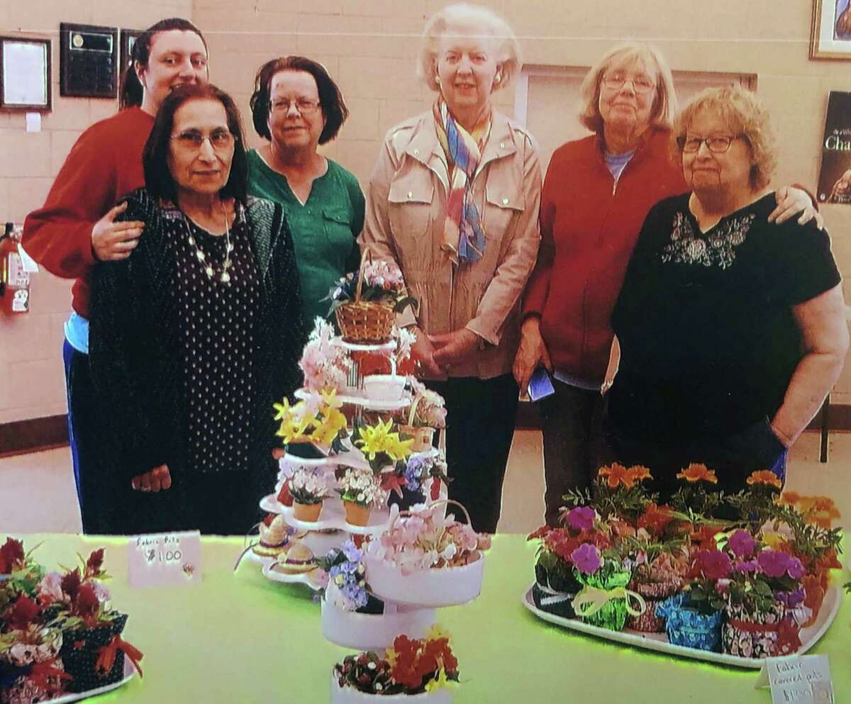 The St. Francis Women's Guild in New Milford recently held a Mother's Day plant sale. Among those present for the event were, from left to right, in front, Phyllis Gonch and Suzanne Moros, and in back, Ann Coppola, Ellen Cote, Joanne Lillis and Adrienne Coppola.