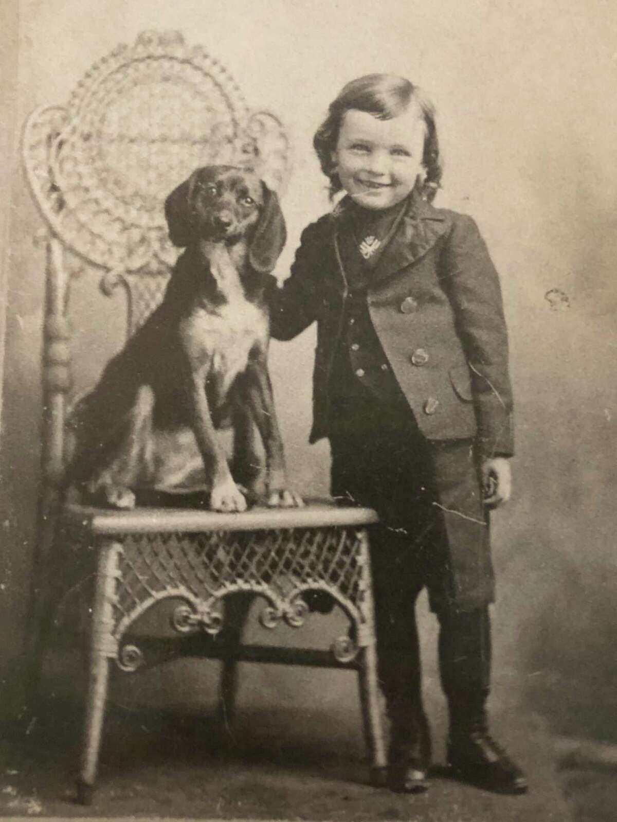 E. Paul Martin, who was born in June 29, 1894, a son of Edward P. and Margaret Flynn Martin,is shown in this 1899 photograph. Martin was the last surviving New Milford veteran of World War I and a former three-term first selectman. At the time of his death in 1998, he was the town's oldest native son. He and his brother William established Martin Brothers Plumbing and Heating in Washington in 1921 and moved the business to New Milford in 1926, where it operated until 1954. During Martin's time as first selectman from 1955-61, he established the New Milford Planning Commission in 1955 and played a major role in bringing the Kimberly Clark Corp. to New Milford in 1958. He also established the first Town Improvement Committee. Martin served as tax collector for the New Milford Fire Association from 1952-57 and served as assessor for the association for many years. Martin was one of the first to speak for the preservation of the old New Milford railroad station, was active in restoring rail service to New Milford and was a member of the Rail Service Restoration Society. He was a member of the Weantinoge Heritage Land Trust, the New Milford Historical Society, and the New Milford Trust for Historic Preservation. He was a talented tinsmith and donated his collection of tinware depicting scenes of New Milford to the historical society in 1995. Martin was involved with Water Witch Hose Co. #2, as well as active in veterans' and civic groups in town. If you have a