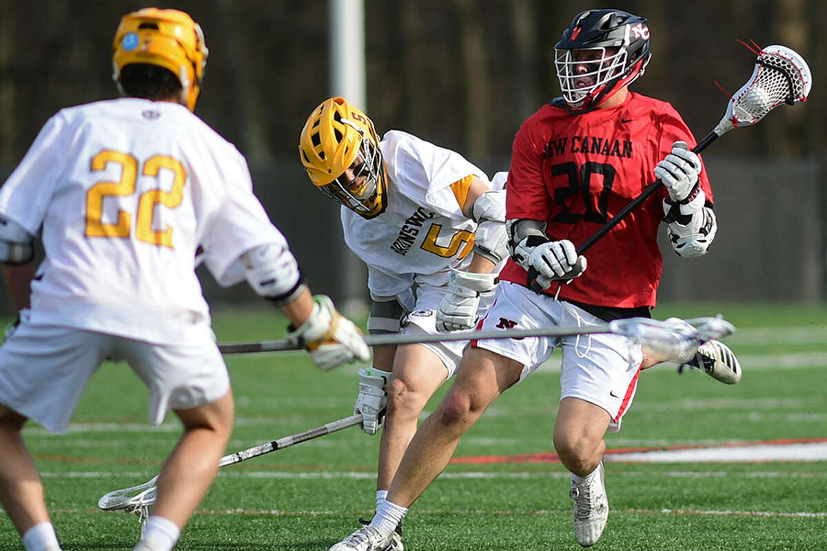 New Canaan's Quintin O'Connell looks for room to shoot during the Rams' game with Brunswick on Saturday at Dunning Field. — Erik Trautmann/Hearst Connecticut Media