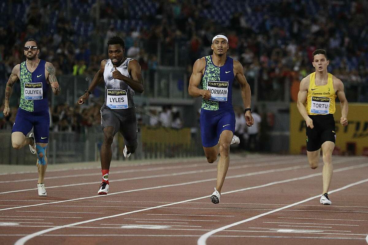 Michael Norman, second from right, on his way to win the men's 200 meters event at the Golden Gala Pietro Mennea track and field meeting in Rome, Thursday, June 6, 2019. (AP Photo/Gregorio Borgia)