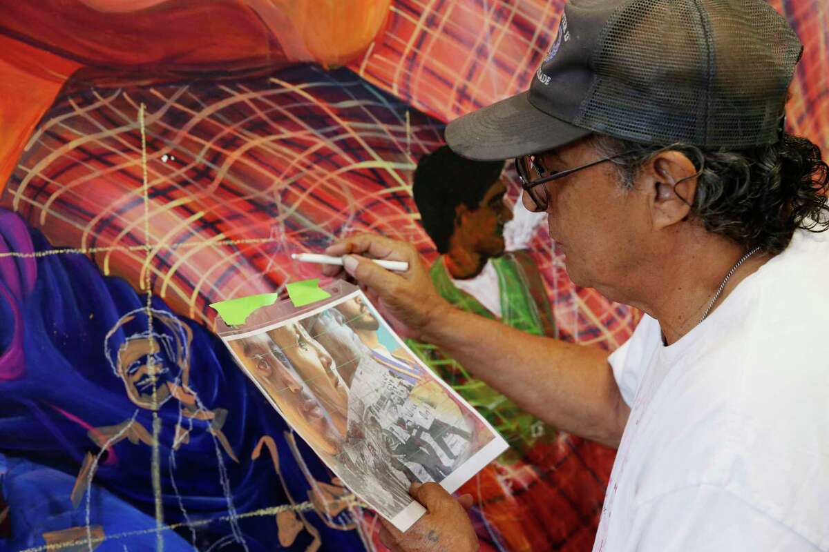 Robert Sifuentes works on a detail of a mural depicting non-traditional students Tuesday at the Palmetto Center for the Arts at Northwest Vista College. The mural is under the Mexican-American Studies Art Project and funded by the National Endowment for the Arts and Northwest Vista College.