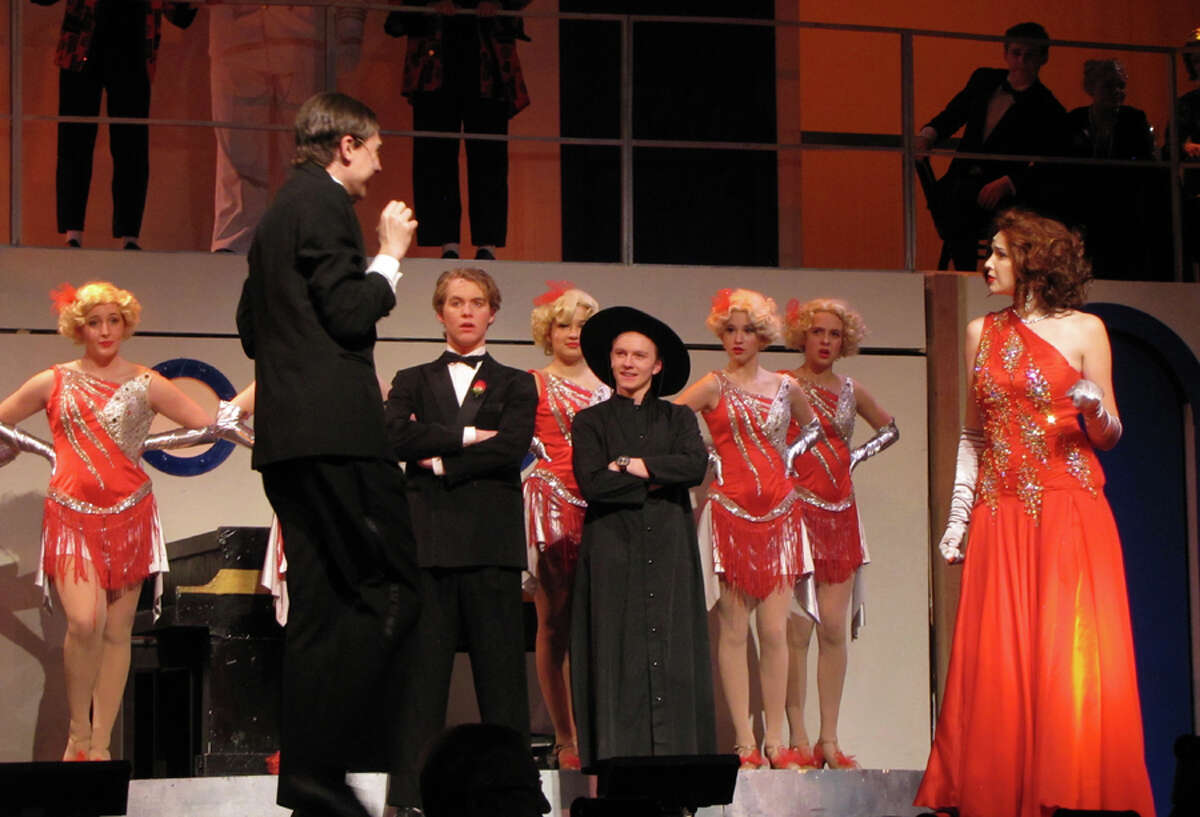 Cast members are shown at a dress rehearsal for Anything Goes opening this weekend at New Canaan High School. Center is Wyatt Lysenko, "Billy Crocker" and to his right William Haddad "Moonface Martin"; along with Sadie Seelert playing "Reno Sweeney"; and Angels in the background. — New Canaan Theatre Department / Contributed photo