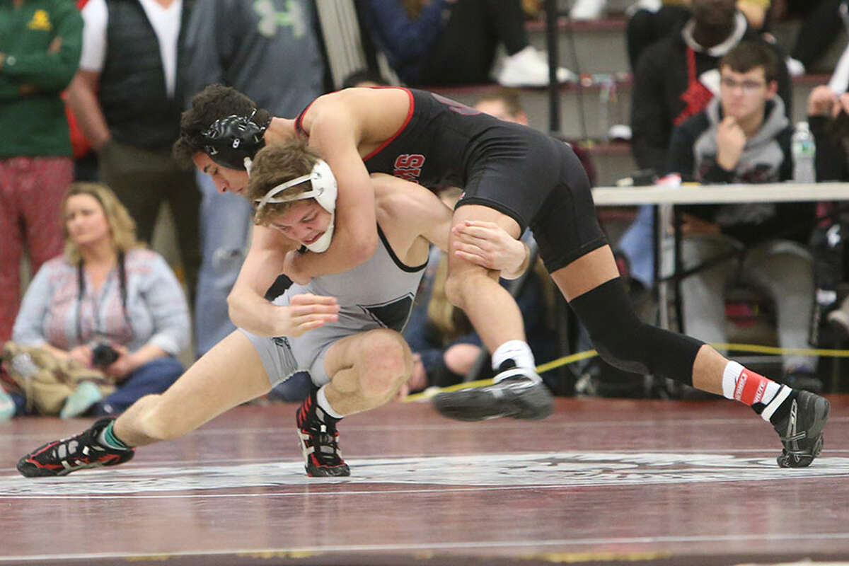 Trumbull, New Milford, Xavier claim wrestling tournament titles