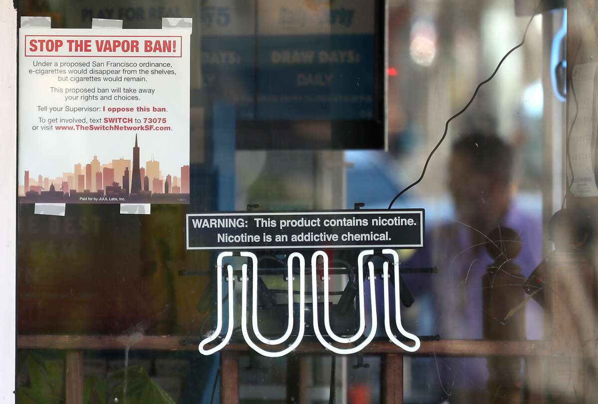 SAN FRANCISCO, CALIFORNIA - JUNE 25: A neon sign advertising Juul e-cigarettes is displayed in a window of a tobacco store on June 25, 2019 in San Francisco, California. The San Francisco Board of Supervisors voted unanimously, 11-0, to be the first city in the United States to ban e-cigarettes, nicotine pods and devices that have not been approved by the Food and Drug Administration. (Photo by Justin Sullivan/Getty Images)