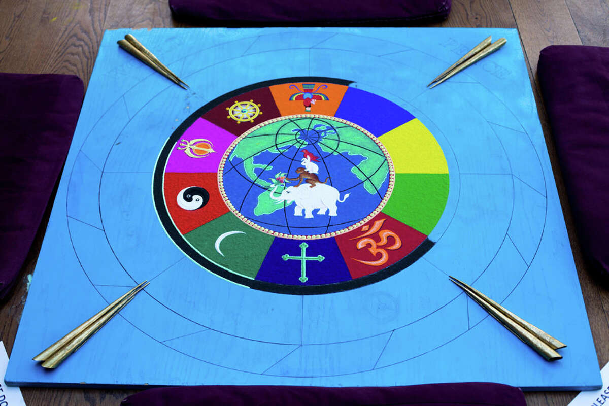 Labrang Tashi Kyil monks created a Sacred Sand Mandala on world peace — an initiative that took four days to complete and involved millions of grains of sand resulting in a multi-colored design, symbolizing harmony and healing — during a recent visit to Silver Hill Hospital.