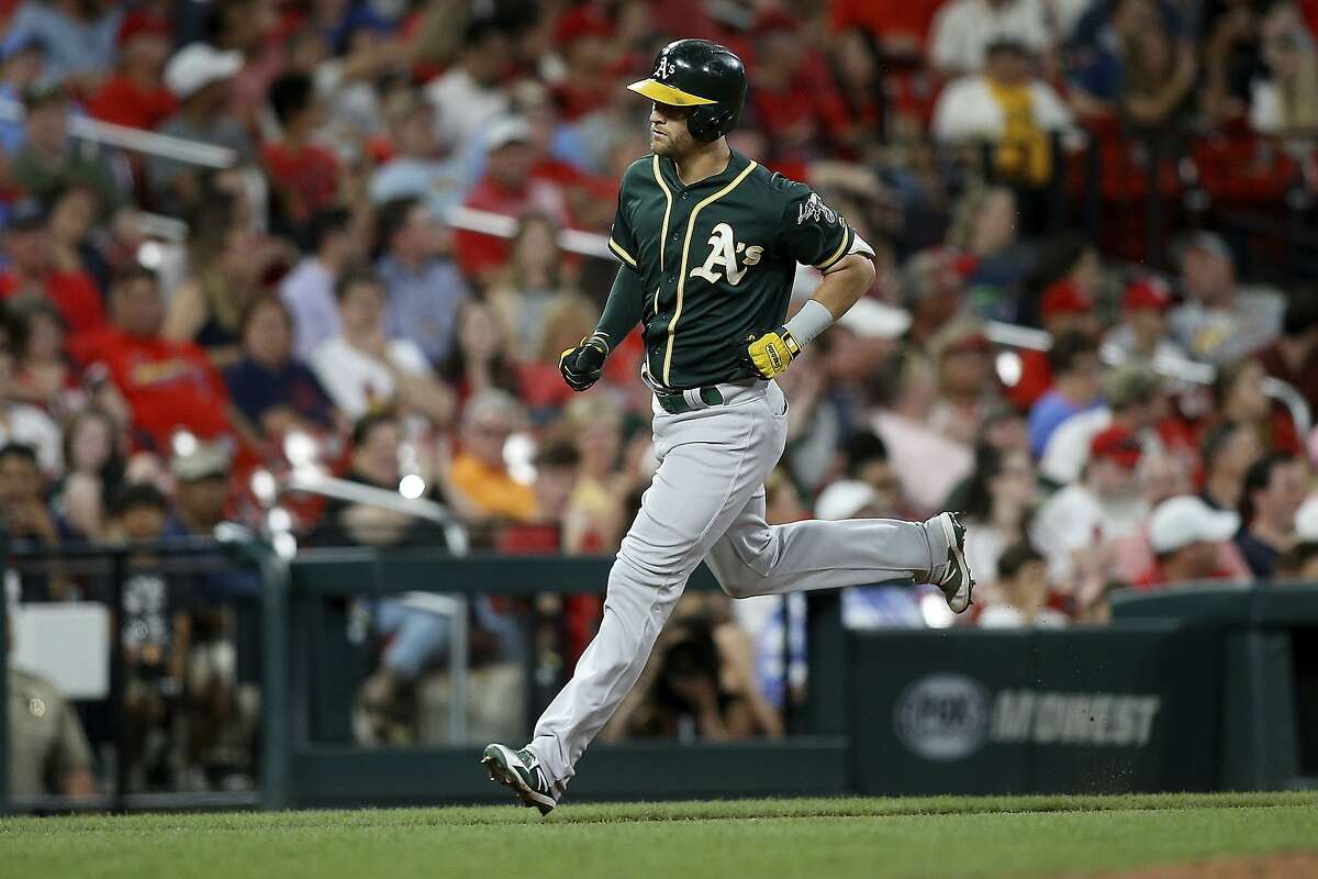Oakland Athletics' Chad Pinder runs the bases after hitting a two-run home run during the fifth inning of the team's baseball game against the St. Louis Cardinals on Tuesday, June 25, 2019, in St. Louis. (AP Photo/Scott Kane)