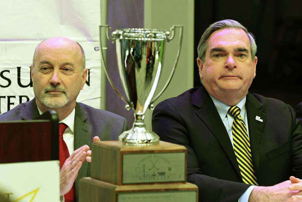 Troy Mayor, Patrick Madden, left, and Schenectady Mayor, Gary McCarthy, right, take part in a press conference to advance the Mayor's Cup hockey games between Union College and Rensselaer Polytechnic Institute on Tuesday, Jan. 8, 2019, at the Times Union Center in Albany, N.Y. (Will Waldron/Times Union)
