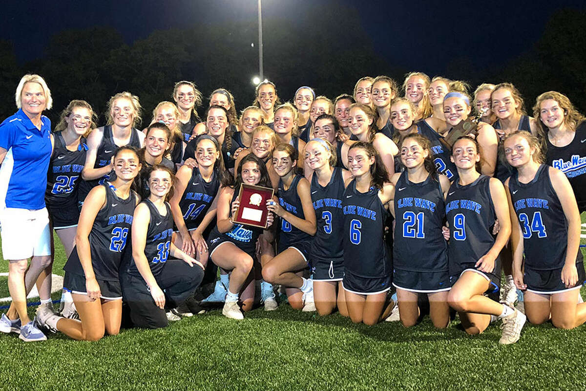 The Darien Blue Wave after winning the FCIAC girls lacrosse championship. — Dave Stewart/Hearst Connecticut Media