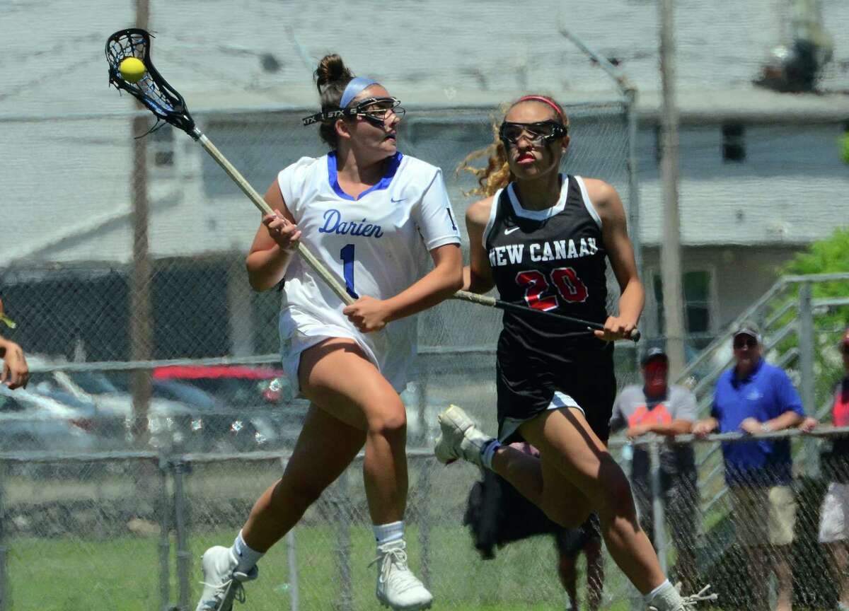 Darien's Nicole Humphrey (1) in action during the CIAC Class L final against New Canaan on June 8. — Christian Abraham/Hearst Connecticut Media