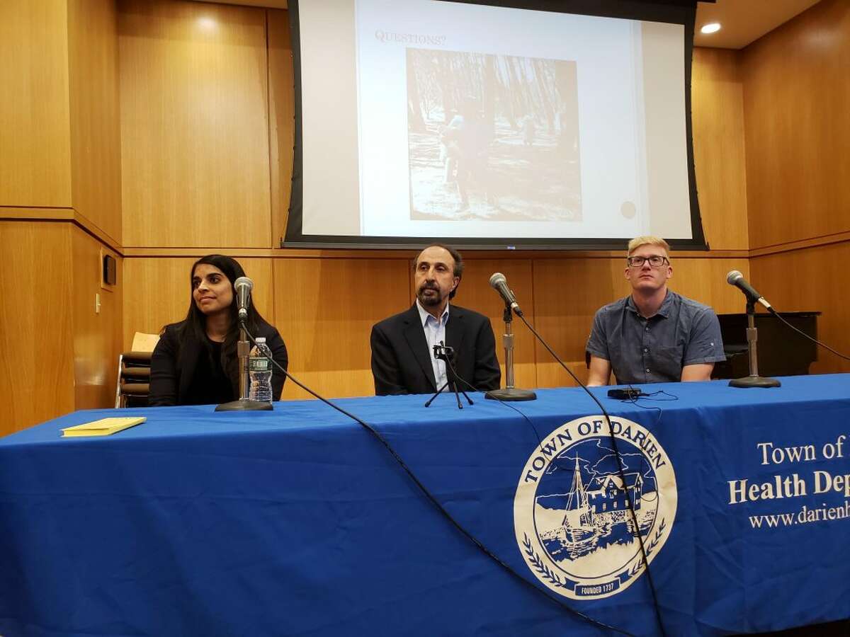Experts on ticks and Lyme disease, from left, Asha Shah, Goudarz Molaei and Joseph McMillan, give a talk at the Darien Library called Fight the Bite. — Sandra Diamond Fox photo