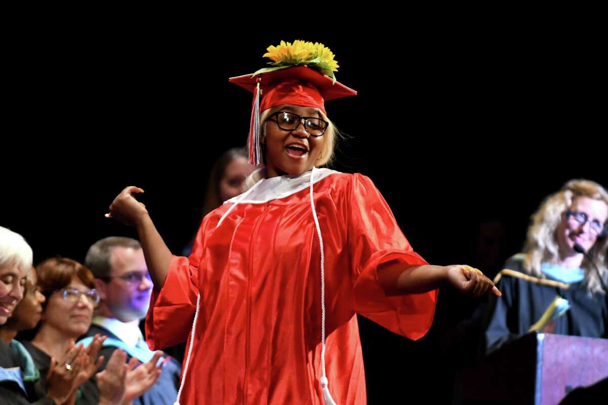 Chanae Washington crosses the stage to receive her diploma during the 27th commencement of Schenectady High School on Wednesday, June 26, 2019, at Proctors Theatre in Schenectady, N.Y. (Catherine Rafferty/Times Union)
