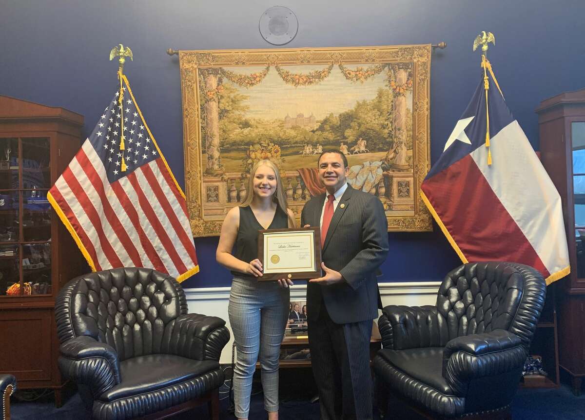 Pleasanton’s Leslie Hartman was recognized in Washington Monday by Congressman Henry Cuellar for winning a congressional art competition.