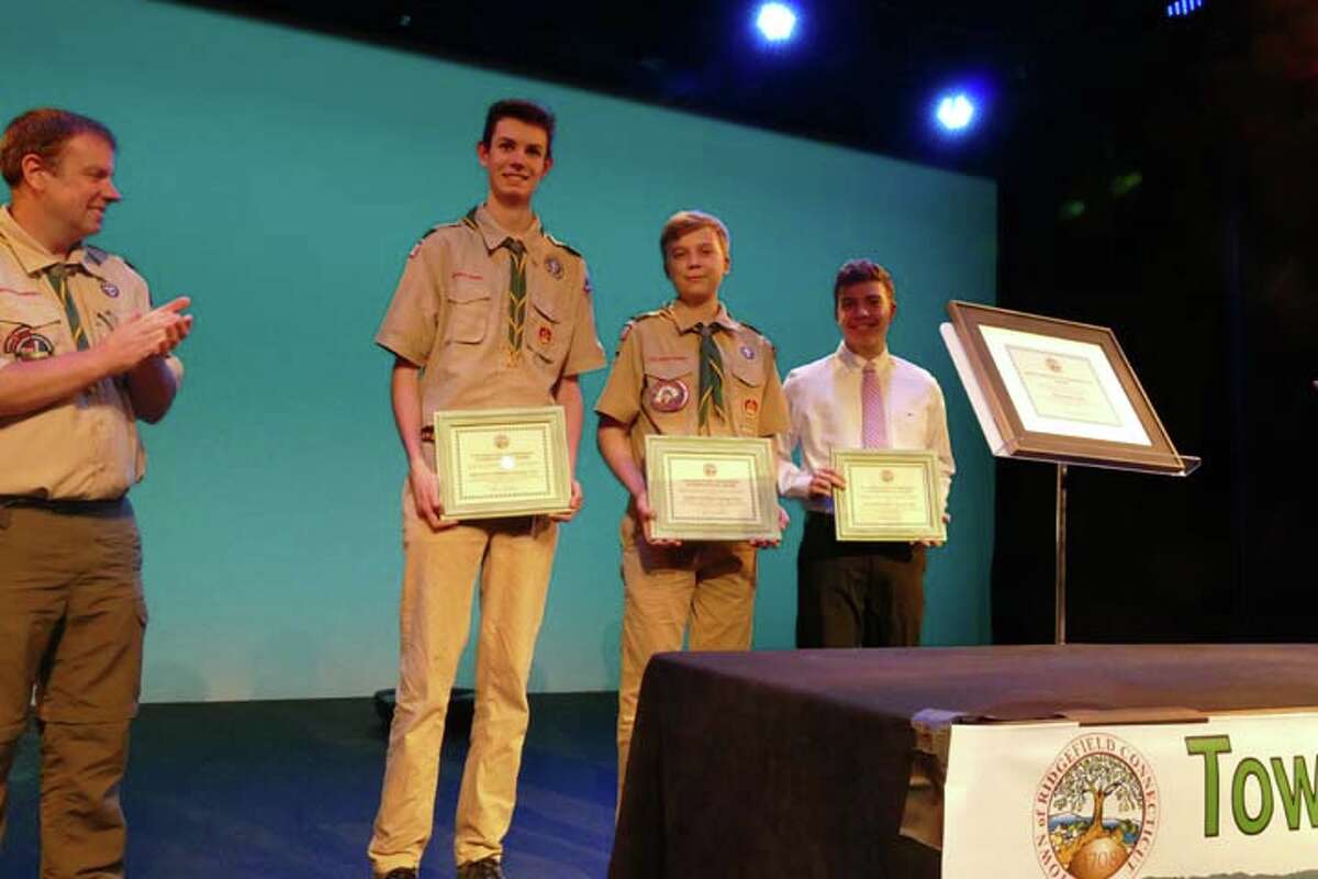 Ridgefield scouts from left to right: Nielsen Gordon, Lukas Dapkus, and Ian Ferguson were presented Environmental Awards for their work on improving Ridgefield’s open spaces and trails.