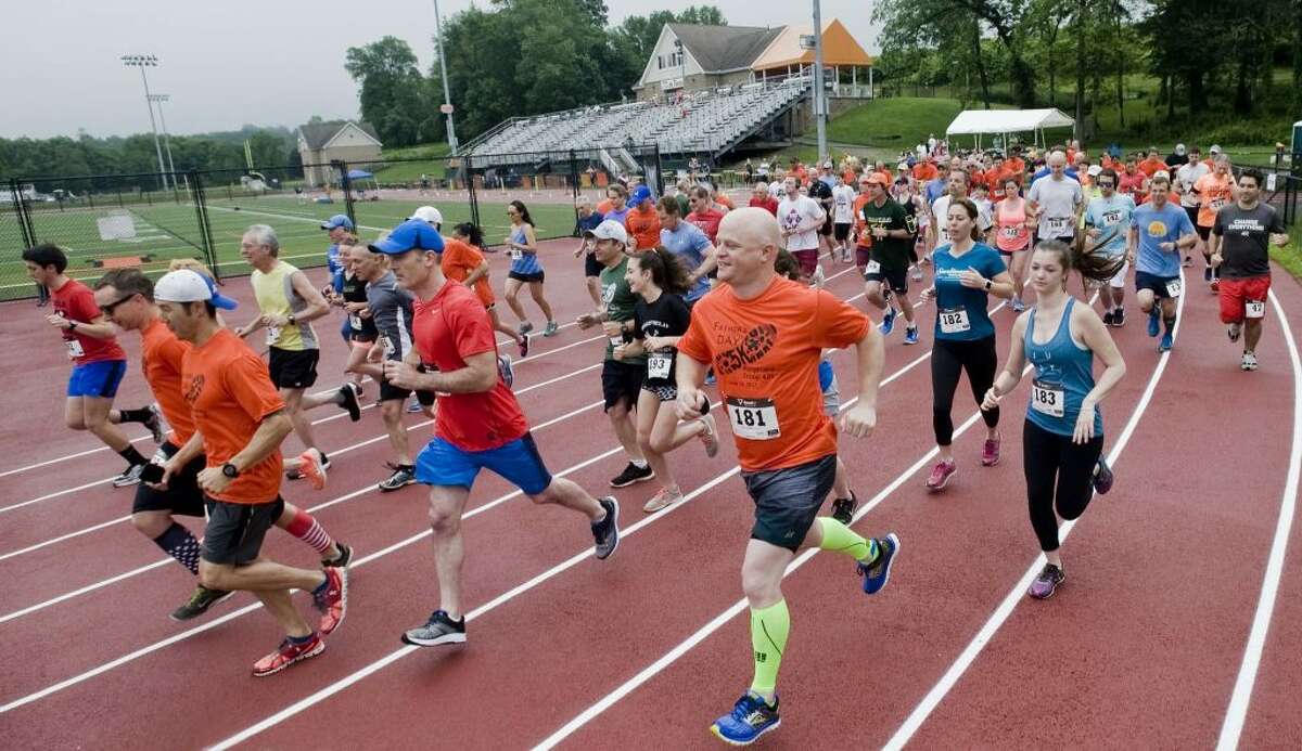 The annual Father's Day 5K race at the Ridgefield High School track in June 2017. The race celebrates its 20th anniversary this year.