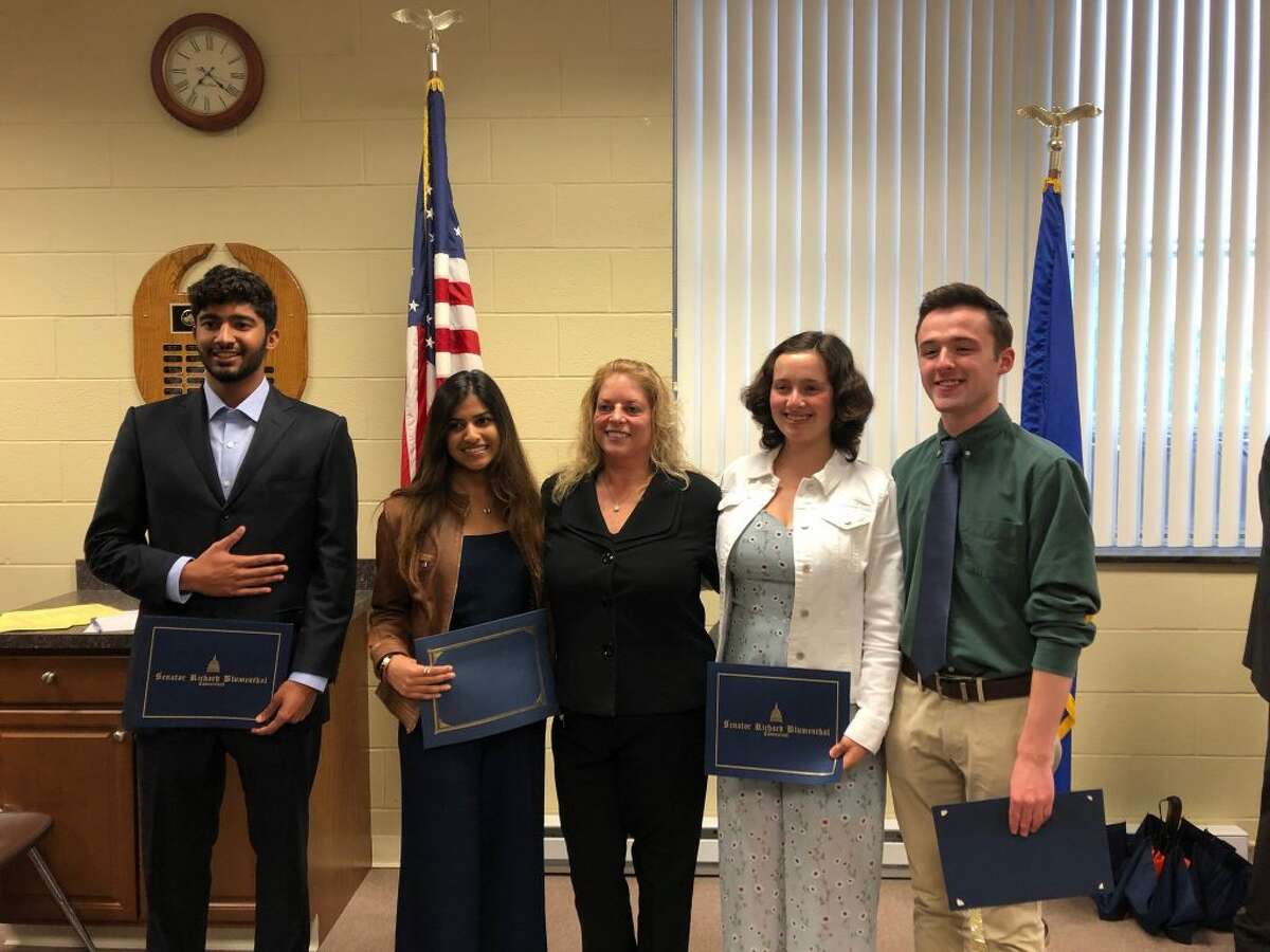 Ridgefield High School Principal Stacey Gross, middle, with Connecticut Association of Boards of Education \student leadership award winners Tara Krishna and Clay Vaughan, left, and Western Connecticut Superintendents Association award winners Sophia Haber and Vidur Hareesh, right. Other CABE recipients were Liliana Matte and Felix Maisonet III from East Ridge Middle School and Juan Pablo Briones Lopez and Corrie Vakil from Scotts Ridge Middle School. Other WCSA recipients were Devon Noonan and Jacob Voellmicke from East Ridge Middle School; Kavya Podila and Shane Miller from Scotts Ridge Middle School.