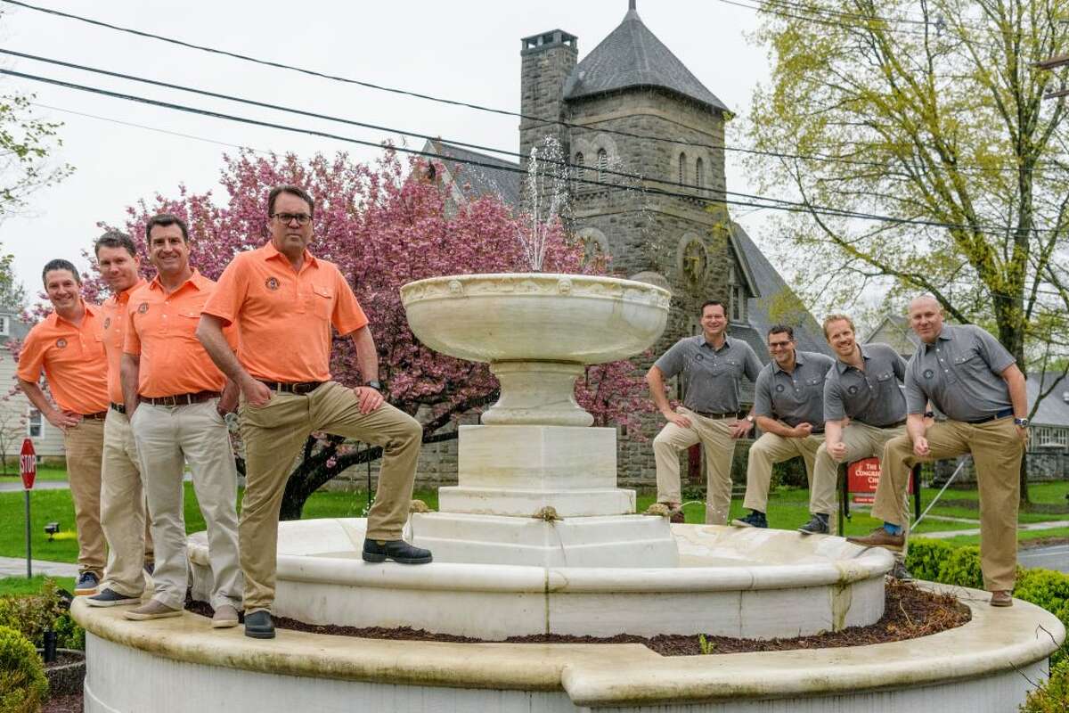 The Ridgefield 8 — Mark Blandford, Bill Diamond, Chris Forsyth, Brendan Kenny, Jeff Levi, Kyle Morehouse, Kristian Ording and Mike Rosella — pose for a picture at The Fountain.