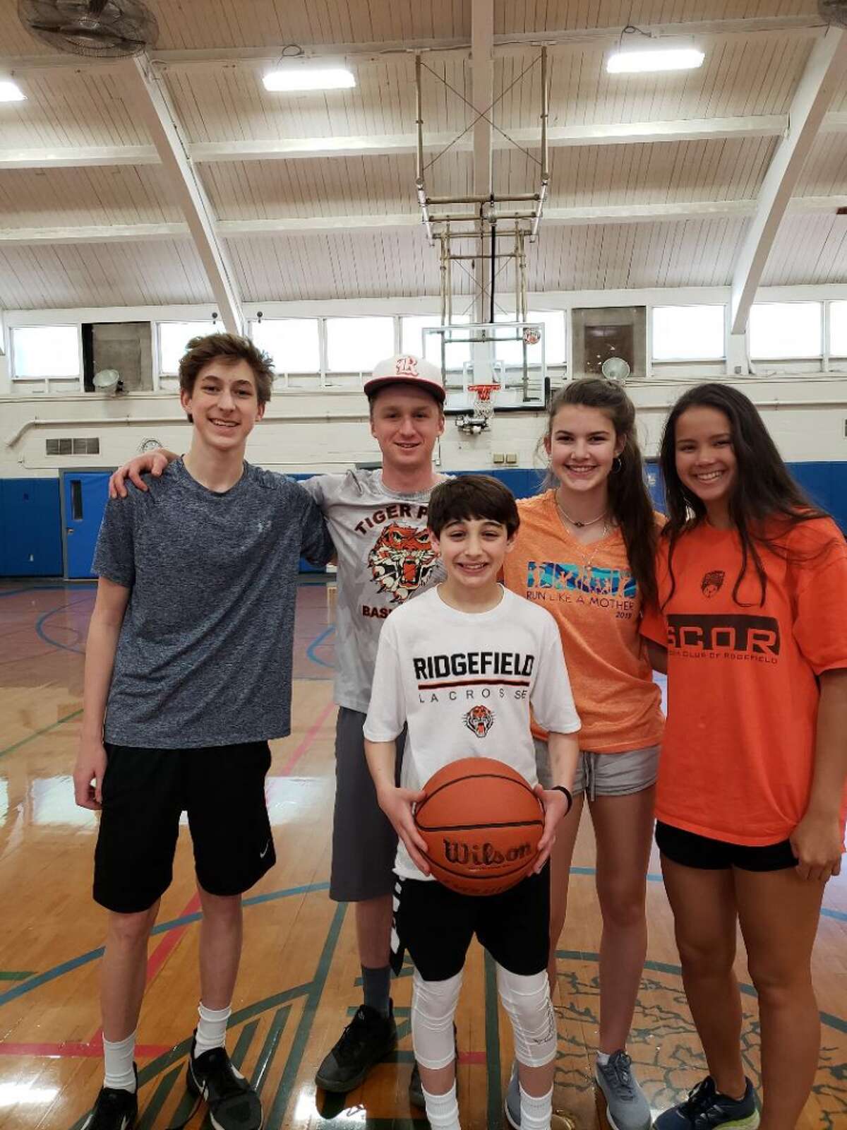 Ridgefield Full Court Peace members (left to right) Shane Gagliardi, Jason Hartnett, Katie Flynn, and Rachel Tomasetti with participant Ethan Serby who requested donations in lieu of Bar Mitzvah presents. Not shown: Full Court Peace members Evan Collins, Finn Atkins, Sean Maue, Max Crowley, Kate Garson, and Jamie Narcisso.