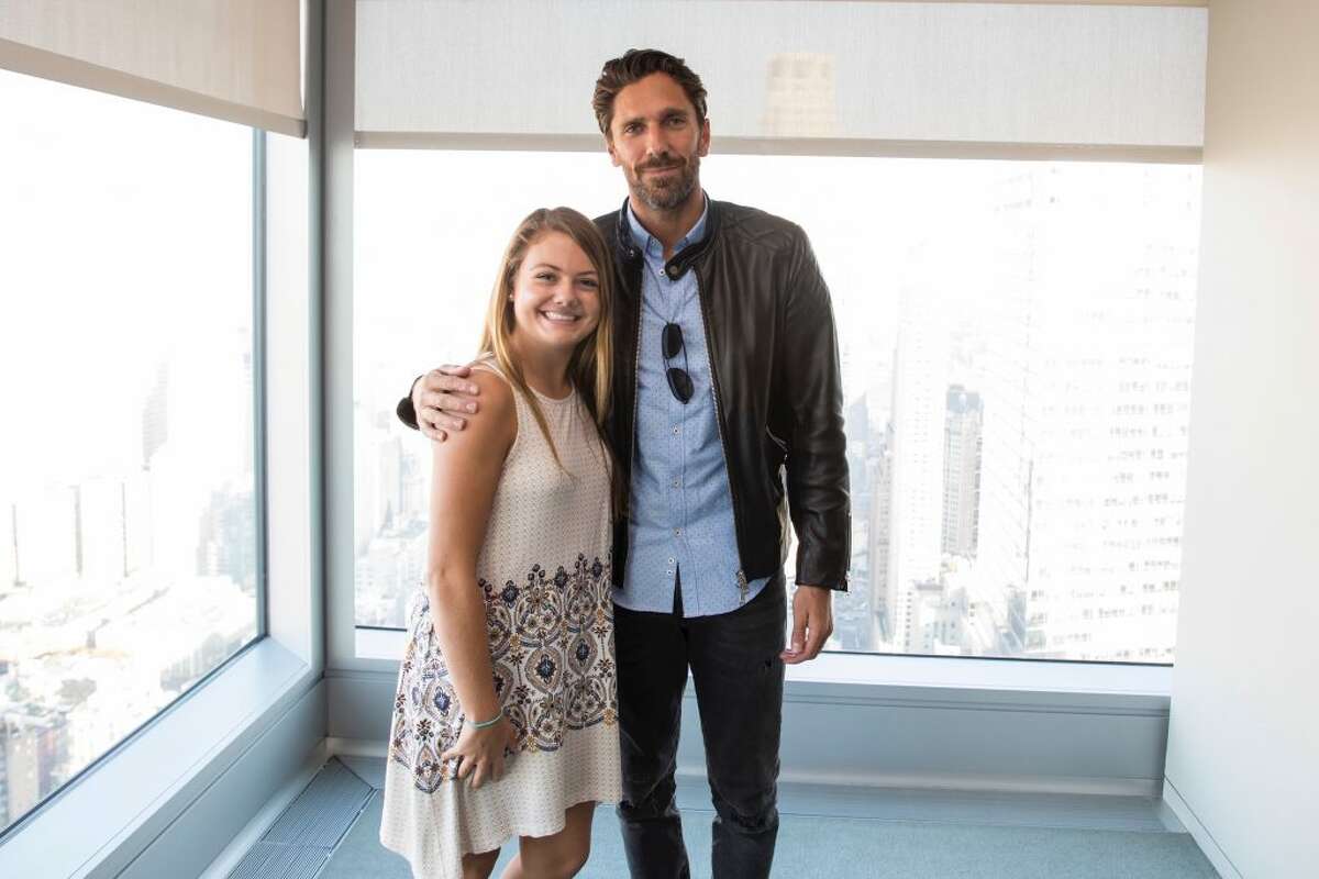 Natalie Kennedy with New York Rangers goalie Henrik Lundqvist. Kennedy, a senior at Immaculate High School received a $25,000 scholarship from the Henrik Lundqvist Foundation and the Garden of Dreams Foundation in April. She will play hockey at Sacred Heart in the fall and enter into the schools honors nursing program.
