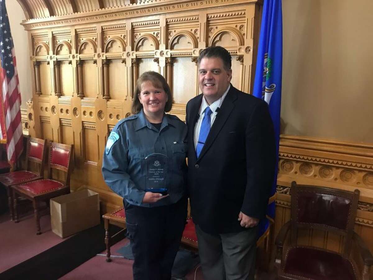 State Rep David Rutigliano recently honored Trumbull EMT Jen DiJoseph at a ceremony at the State Capitol.