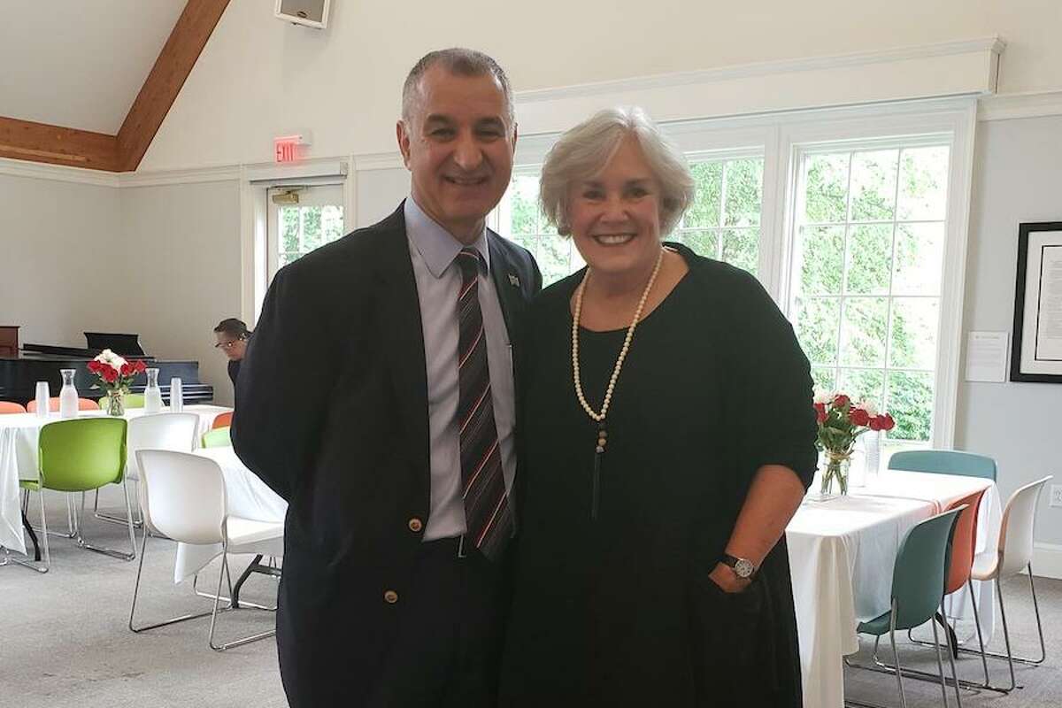 Ceci Maher is joined by state Senator Carlo Leone (D-Stamford) at her retirement party. - Sandra Diamond Fox/Hearst Connecticut Media