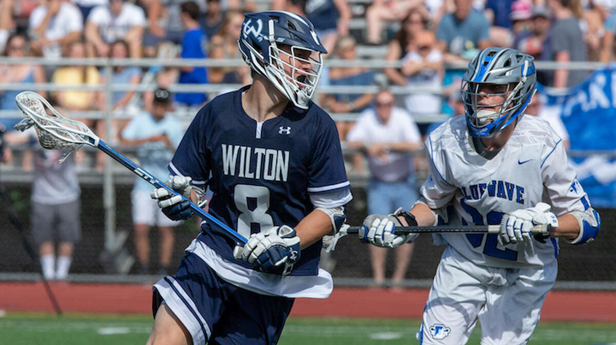 Andrew Luciano gets ready to score the first of his two goals in Wilton's 13-3 loss to Darien in the Class L state finals. — GretchenMcMahonPhotography.com