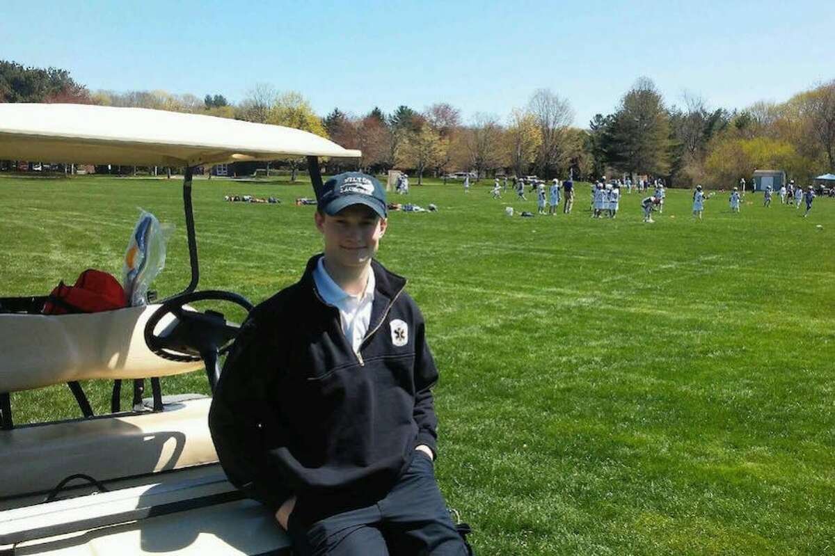 Wilton Volunteer Ambulance Corps EMT Chris Sweeney on call at an athletic event. Sweeney helped save the life of a man who was electrocuted. - Contributed photo